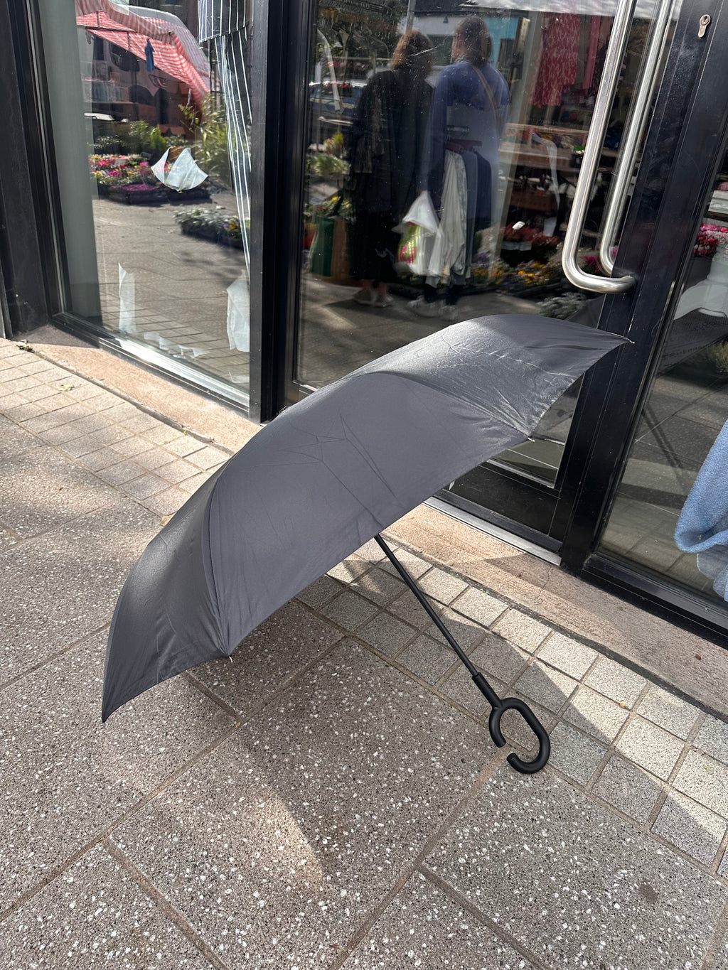 WHITE AND BLACK UMBRELLA