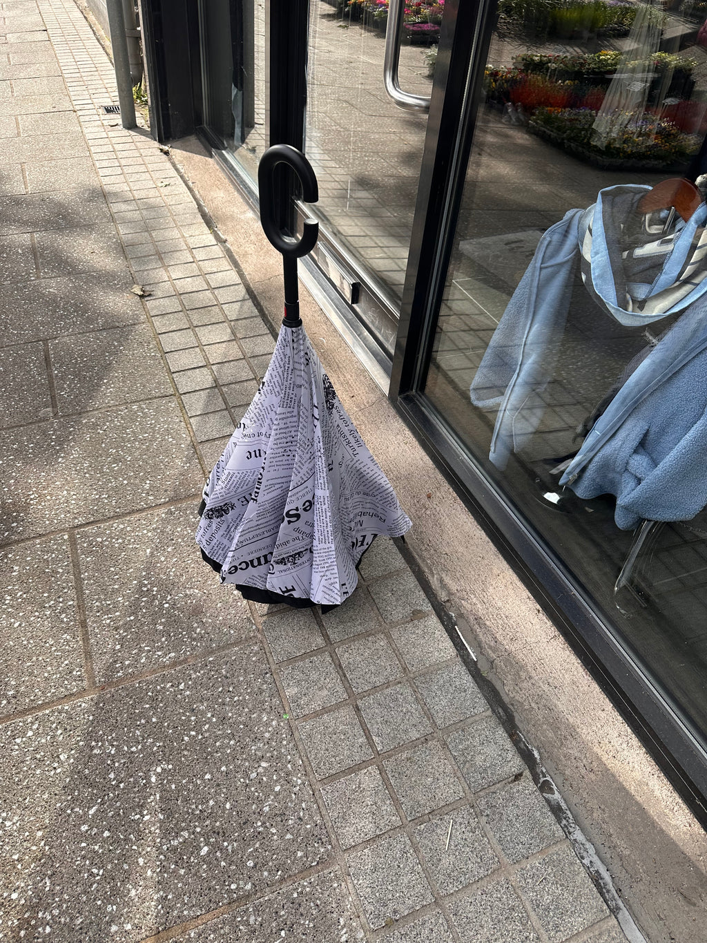 WHITE AND BLACK UMBRELLA