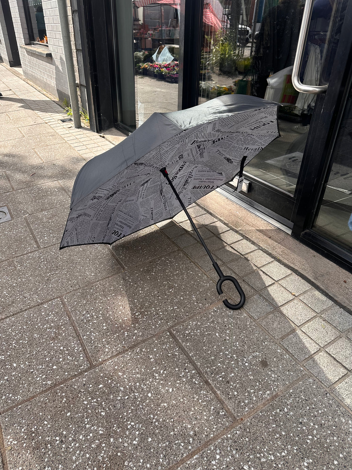 WHITE AND BLACK UMBRELLA